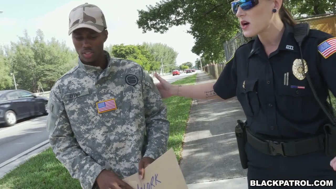 White female cops arrest a black guy for stolen valor and fuck image