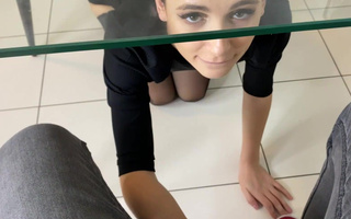 Pretty teen gives a blowjob under the table to get a job of her dream