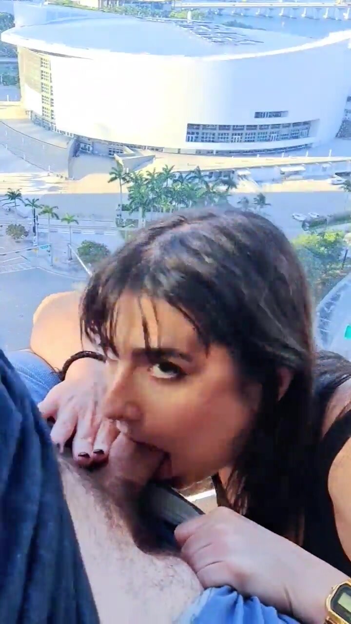 Giving Him A Blowjob On The Balcony