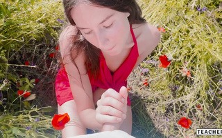 Girl decided to give me a nice blowjob during our camping in a field of red flowers