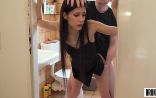 In the bathroom, Butt Spencer doggystyles the skinny brunette