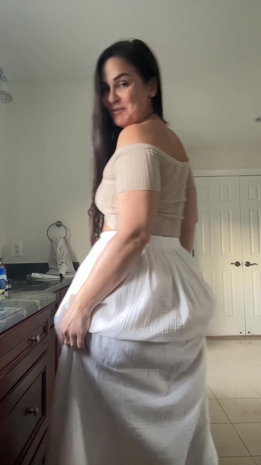 I love wearing a ladylike skirt but then lifting it up to show off my big fat ass