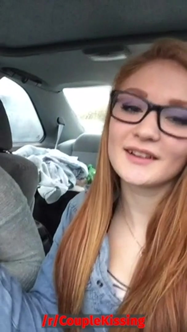 Two cute lesbians kissing passionately in the car